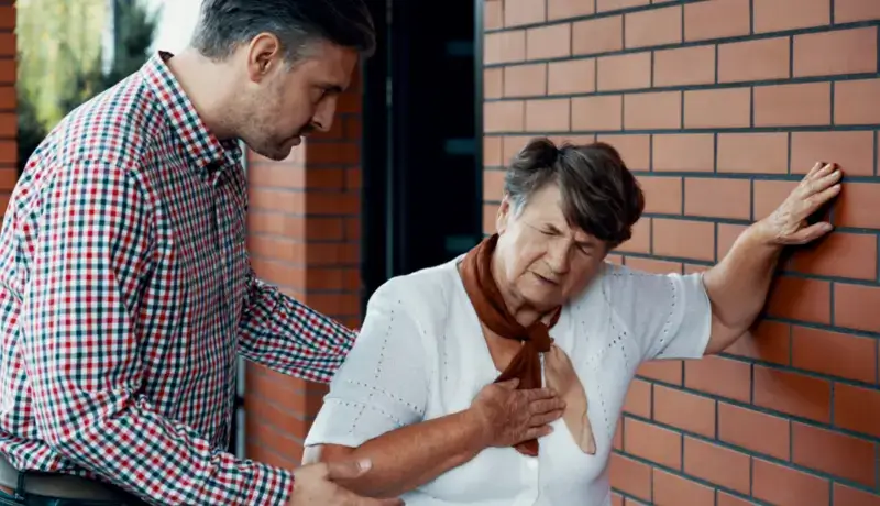 A woman with difficulties in breathing