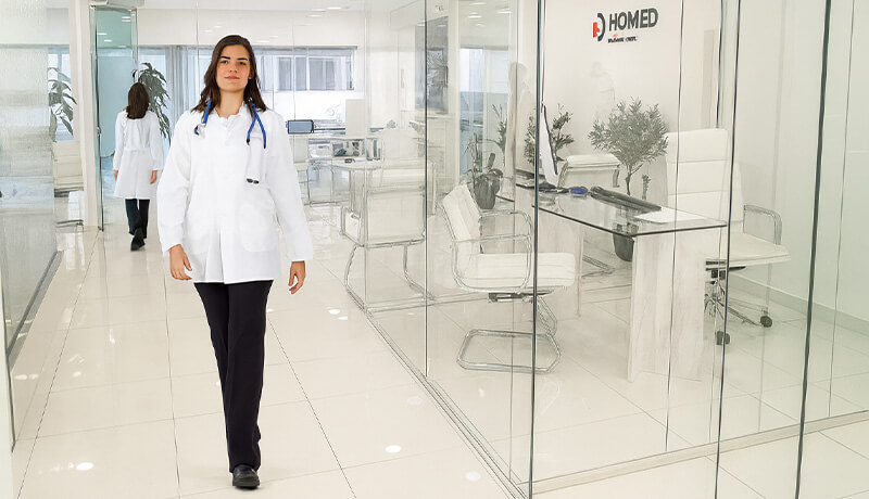 Consulting rooms with glass walls and natural lighting.